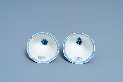 A Chinese blue and white teapot and a pair of wine cups, Kangxi