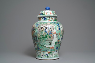 A pair of large Chinese famille verte vases and covers, Kangxi