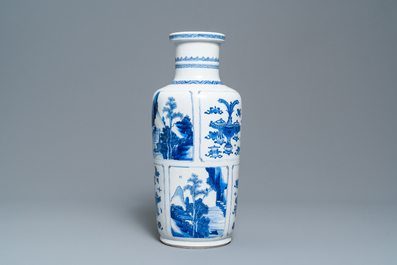 A Chinese blue and white 'antiquities and landscapes' rouleau vase, Kangxi