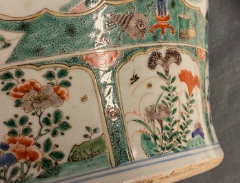 A pair of large Chinese famille verte vases and covers, Kangxi