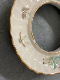 Two Chinese famille rose teapots and four covered bowls on stands, 19th C.