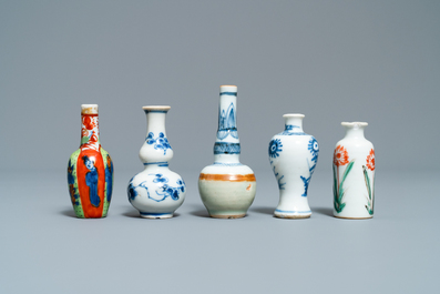 Fifteen Chinese mostly blue and white miniature vases, Kangxi