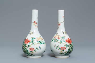 A pair of Chinese famille rose bottle vases, 19th C.