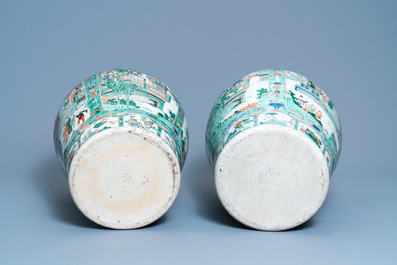 A pair of large Chinese famille verte vases and covers, Kangxi