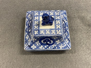 A pair of Chinese blue and white square vases and covers, Kangxi