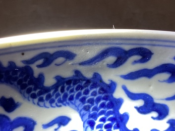 A Chinese blue and white 'dragon' dish, Kangxi mark and of the period