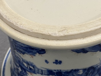 A fine Chinese blue, white and copper red 'Master of the Rocks' brush pot, Kangxi