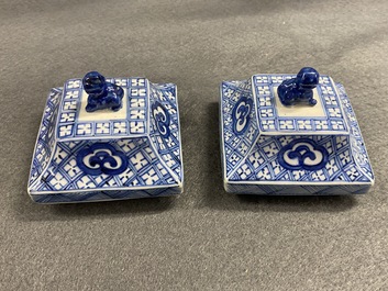 A pair of Chinese blue and white square vases and covers, Kangxi