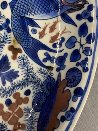 A Chinese blue, white and copper red 'crab and fish' dish, Kangxi