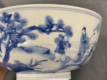 Un bol en porcelaine de Chine en bleu et blanc &agrave; d&eacute;cor de lettr&eacute;s et leurs servants, marque et &eacute;poque de Kangxi