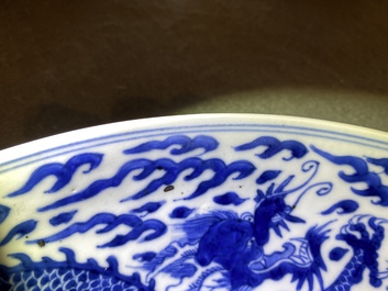 A Chinese blue and white 'dragon' dish, Kangxi mark and of the period