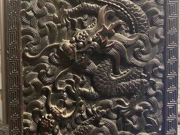 Un petit cabinet en bois sculpt&eacute; &agrave; d&eacute;cor de dragons, Chine, R&eacute;publique