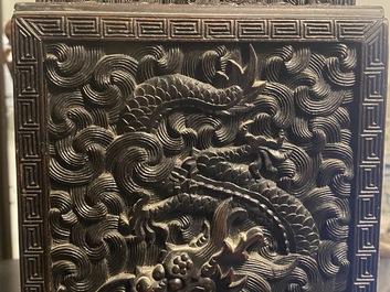 Un petit cabinet en bois sculpt&eacute; &agrave; d&eacute;cor de dragons, Chine, R&eacute;publique