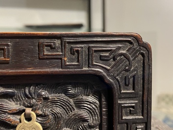 A small Chinese carved wooden 'dragon' cabinet, Republic