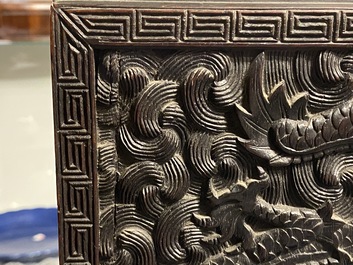 Un petit cabinet en bois sculpt&eacute; &agrave; d&eacute;cor de dragons, Chine, R&eacute;publique