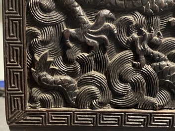 Un petit cabinet en bois sculpt&eacute; &agrave; d&eacute;cor de dragons, Chine, R&eacute;publique