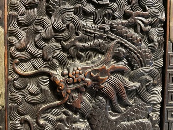 Un petit cabinet en bois sculpt&eacute; &agrave; d&eacute;cor de dragons, Chine, R&eacute;publique