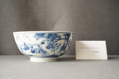 A Chinese blue and white 'scholars and attendants' bowl, Kangxi mark and of the period