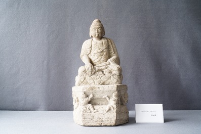 A Chinese carved stone group of Buddha on a throne, Wei or later