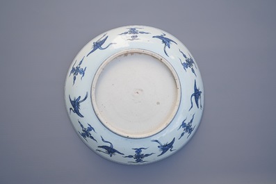 A large Chinese blue and white dish with a landscape with pagoda, Jiajing