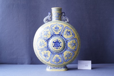 A Chinese yellow-ground blue and white 'Bajixiang' moon flask vase, Yongzheng mark, 19/20th C.