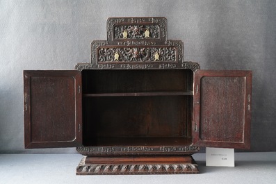 A small Chinese carved wooden 'dragon' cabinet, Republic