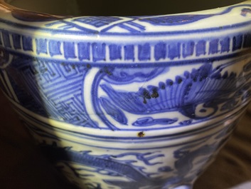 A Chinese blue and white 'dragon' tripod censer, Ming