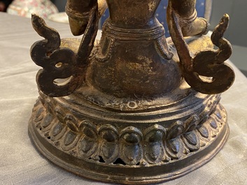 A Nepalese gilt bronze figure of White Tara, 16th C.