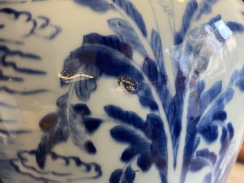 A Chinese blue and white vase with figures in an interior, Kangxi