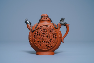 A Chinese silver-mounted reticulated double-walled Yixing stoneware teapot, Kangxi