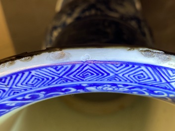 A pair of large Chinese blue and white 'Long Eliza' beaker vases, Kangxi