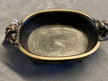 A Chinese chilong-handled bronze censer, Xuande mark, Ming