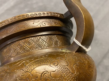 A Chinese bronze tripod censer with 'lotus leaf' cover and stand, 17/18th C.