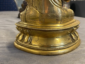 A Chinese gilt bronze figure of Buddha, 17th C.