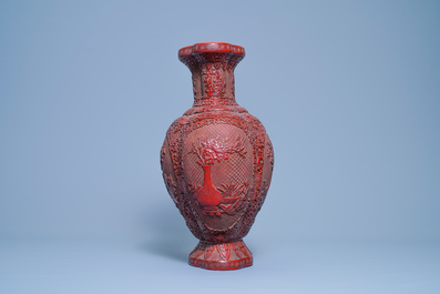A Chinese carved red lacquer vase, Qianlong mark, 19/20th C.