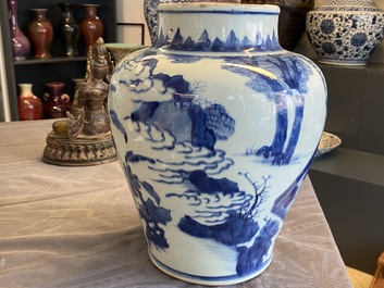 Een Chinese blauw-witte vaas met figuren in een interieur, Kangxi