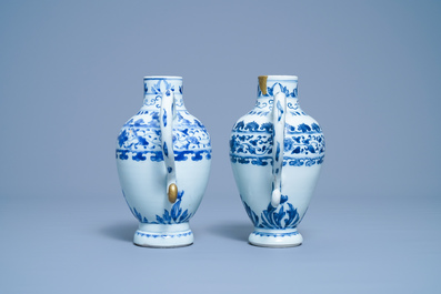 A pair of Chinese blue and white ewers, Transitional period