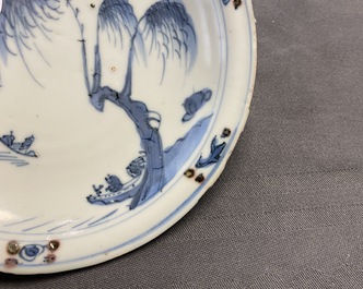 A Chinese blue, white and copper red plate, Ming