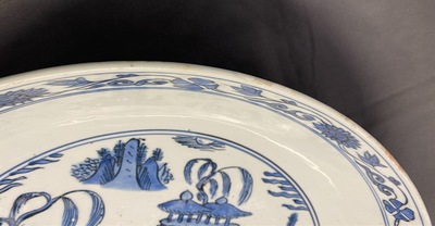 A large Chinese blue and white dish with a landscape with pagoda, Jiajing