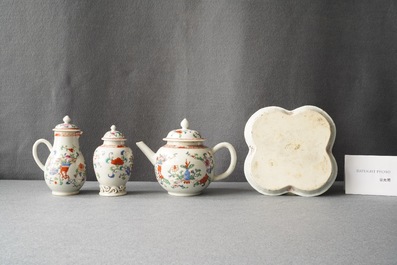 A Chinese famille rose teapot, tea caddy, milk jug and tray, Qianlong