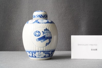 A Chinese ribbed blue and white jar and cover, Kangxi