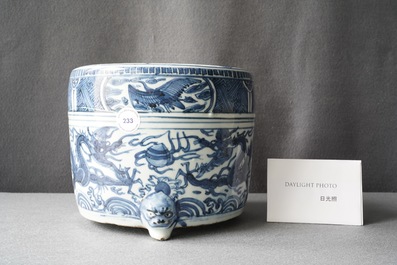 A Chinese blue and white 'dragon' tripod censer, Ming