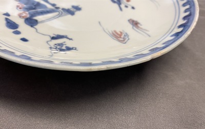 A Chinese blue, white and copper red plate, Ming