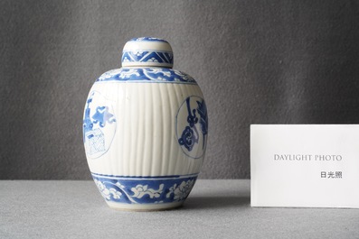 A Chinese ribbed blue and white jar and cover, Kangxi