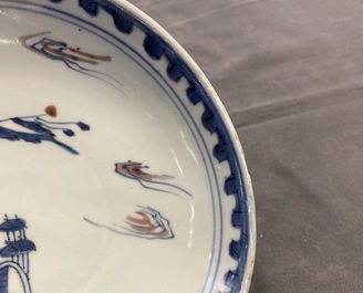 A Chinese blue, white and copper red plate, Ming