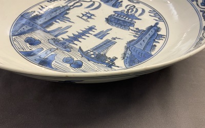 A large Chinese blue and white dish with a landscape with pagoda, Jiajing