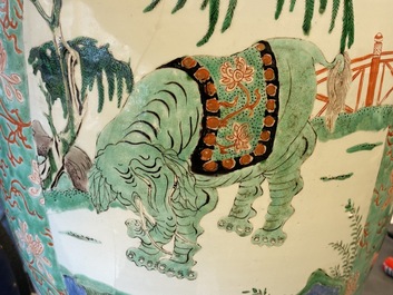 A large Chinese famille verte 'mythical beasts' jar with wooden cover, Kangxi