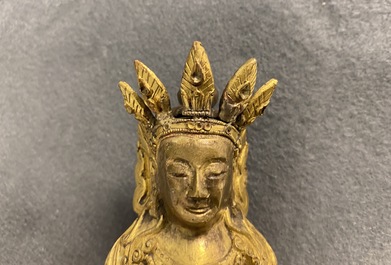 A Sino-Tibetan gilt bronze figure of Buddha, 18th C.