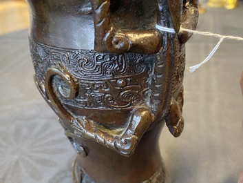 A Chinese dragon-handled bronze vase, Ming