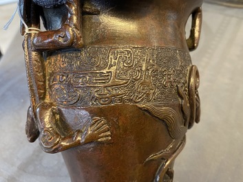 A Chinese dragon-handled bronze vase, Ming